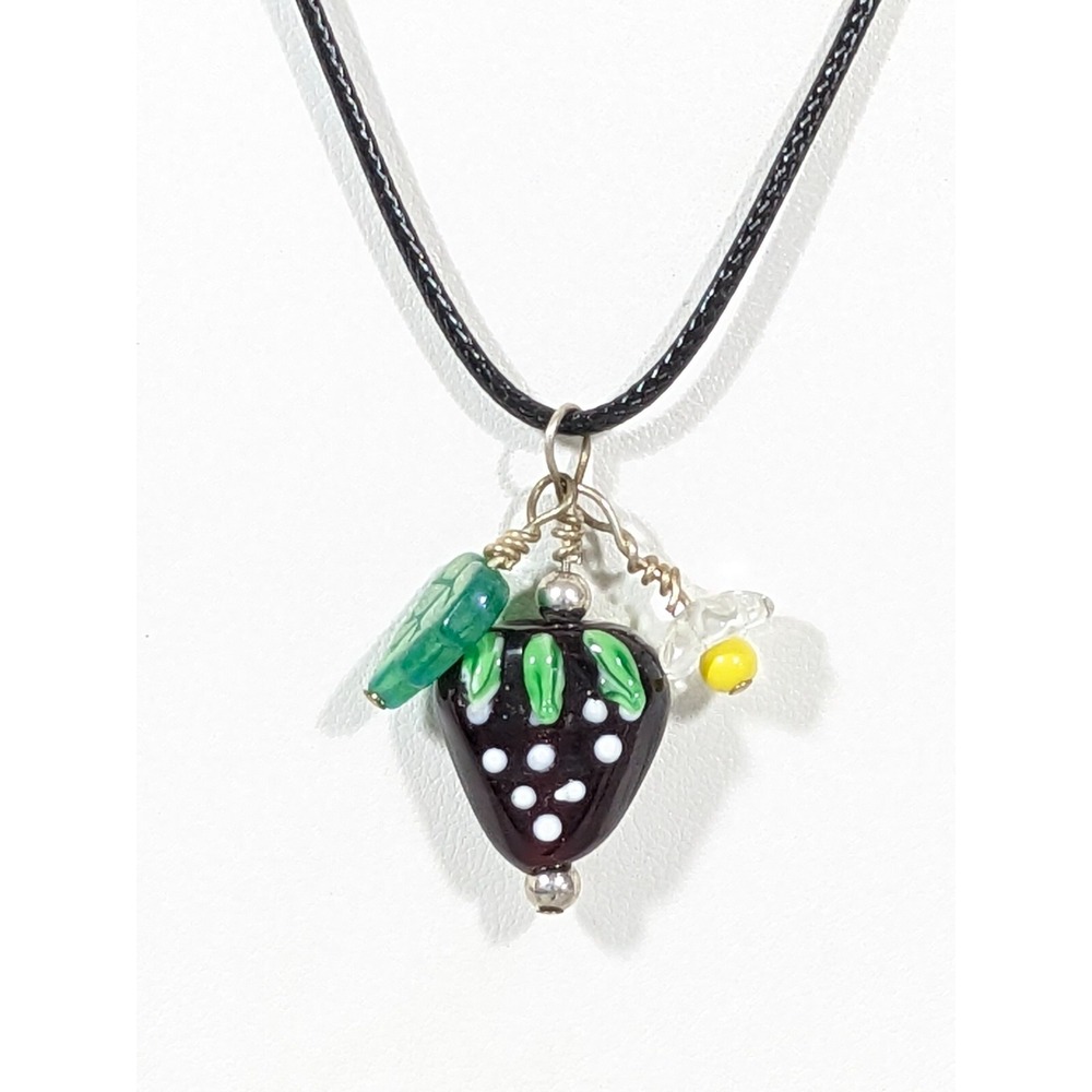 Art Glass Strawberry Pendant Necklace Red Green on Black Cord 19"